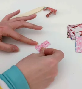 Pliage de carpe en origami par Céline